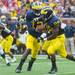 Michigan quarterback Devin Gardner hands the ball off to running back Fitzgerald Toussaint during the first quarter of their game against Central Michigan, Saturday, Aug, 31.
Courtney Sacco I AnnArbor.com  